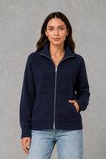 Women’s zip up knit cardigan with a cosy funnel neck, relaxed fit, long sleeves, ribbed trims and practical front patch pockets.
