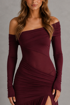 Burgundy off-shoulder dress with long sleeves on a gray background