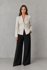 Women’s beige tailored blazer with single-button fastening, notched lapels, long sleeves and a fitted waist.