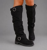 Women's black mid-calf slouch boots with decorative buckle accents, soft synthetic upper, slip-on design and durable rubber sole, styled for everyday casual wear.