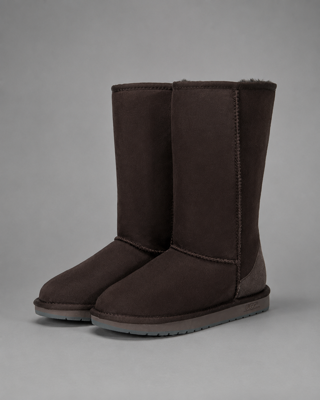 Women's bow detail mid-calf snow boots with a soft faux fur upper, warm fleece lining, slip-on design, flat heel, cushioned plush insole and non-slip rubber sole, available in beige, brown, grey and black for cosy everyday winter wear.