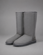 Women's bow detail mid-calf snow boots with a soft faux fur upper, warm fleece lining, slip-on design, flat heel, cushioned plush insole and non-slip rubber sole, available in beige, brown, grey and black for cosy everyday winter wear.