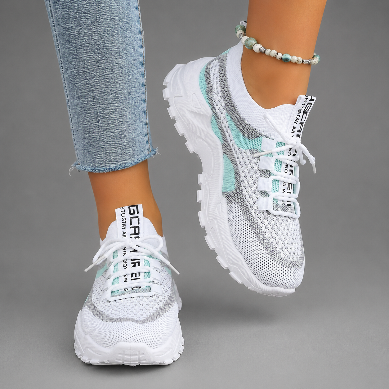 Women's lightweight breathable walking trainers with mesh upper, cushioned sole and lace-up design, available in blue, turquoise and pink for comfortable everyday walking and casual wear.