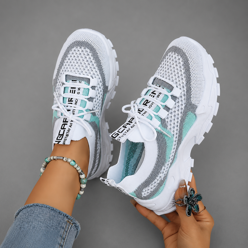 Women's lightweight breathable walking trainers with mesh upper, cushioned sole and lace-up design, available in blue, turquoise and pink for comfortable everyday walking and casual wear.
