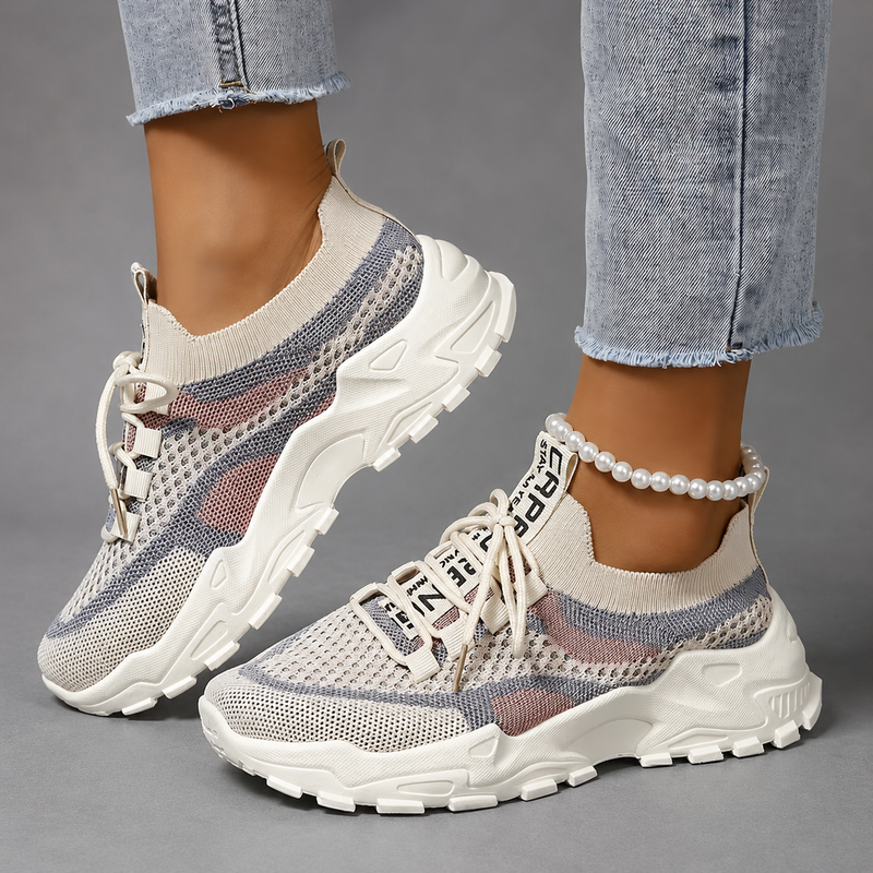 Women's lightweight breathable walking trainers with mesh upper, cushioned sole and lace-up design, available in blue, turquoise and pink for comfortable everyday walking and casual wear.