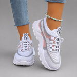 Women's lightweight breathable walking trainers with mesh upper, cushioned sole and lace-up design, available in blue, turquoise and pink for comfortable everyday walking and casual wear.