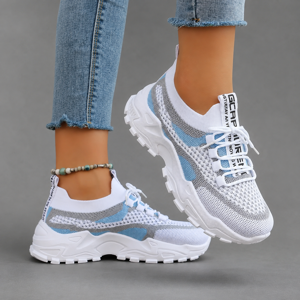 Women's lightweight breathable walking trainers with mesh upper, cushioned sole and lace-up design, available in blue, turquoise and pink for comfortable everyday walking and casual wear.