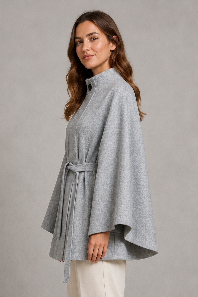 Women's elegant wool-blend cape sleeve coat with stand collar, slim tailored fit and belted waist, ideal for autumn and winter formal wear.