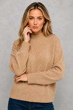 Women's premium cashmere turtleneck sweater with a regular fit, soft-touch knit, long sleeves, and a cosy high neckline for everyday wear.