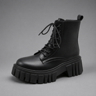 Women's black chunky sole combat boots with lace-up fastening, ankle-height design, round toe, medium square heel and durable rubber sole for casual everyday wear.