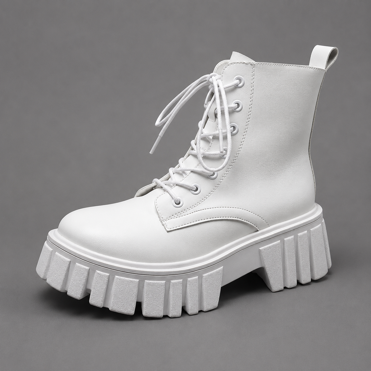 Women's black chunky sole combat boots with lace-up fastening, ankle-height design, round toe, medium square heel and durable rubber sole for casual everyday wear.