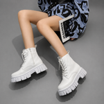 Women's black chunky sole combat boots with lace-up fastening, ankle-height design, round toe, medium square heel and durable rubber sole for casual everyday wear.