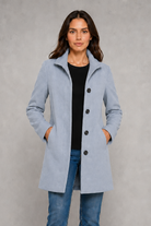 Women’s classic button-front coat with an elegant straight fit, long sleeves and a timeless design for autumn and spring wear.