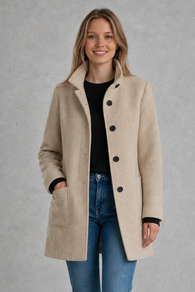 Women's classic longline winter coat with a tailored straight fit, button-front fastening, side pockets and elegant lapel collar, designed for warm, timeless autumn and winter styling.