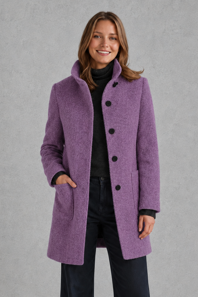 Women's classic longline winter coat with a tailored straight fit, button-front fastening, side pockets and elegant lapel collar, designed for warm, timeless autumn and winter styling.
