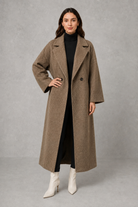 Women’s classic wool maxi coat with a relaxed longline silhouette, minimalist styling and traditional front button fastening for autumn and winter.