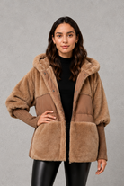 Women’s cosy longline hooded winter coat with soft lining for warm everyday wear