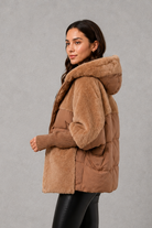 Women’s cosy longline hooded winter coat with soft lining for warm everyday wear