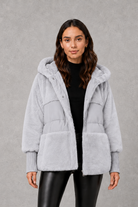 Women’s cosy longline hooded winter coat with soft lining for warm everyday wear