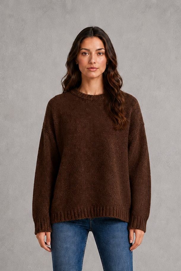 Light grey women’s crew neck knit jumper with an oversized relaxed fit, dropped shoulders and loose wide long sleeves.