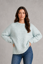Light grey women’s crew neck knit jumper with an oversized relaxed fit, dropped shoulders and loose wide long sleeves.