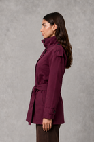 Women’s cropped belted jacket with double-breasted front and high collar