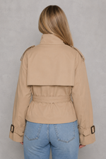 Women's cropped belted trench coat in a lightweight cotton-blend fabric with a double-breasted front, classic lapel collar, adjustable waist belt and modern cropped fit, ideal for smart casual everyday wear.