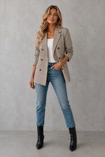 Women's double-breasted plaid blazer with a tailored fit, lapel collar, long sleeves and classic check pattern for work and smart casual occasions.