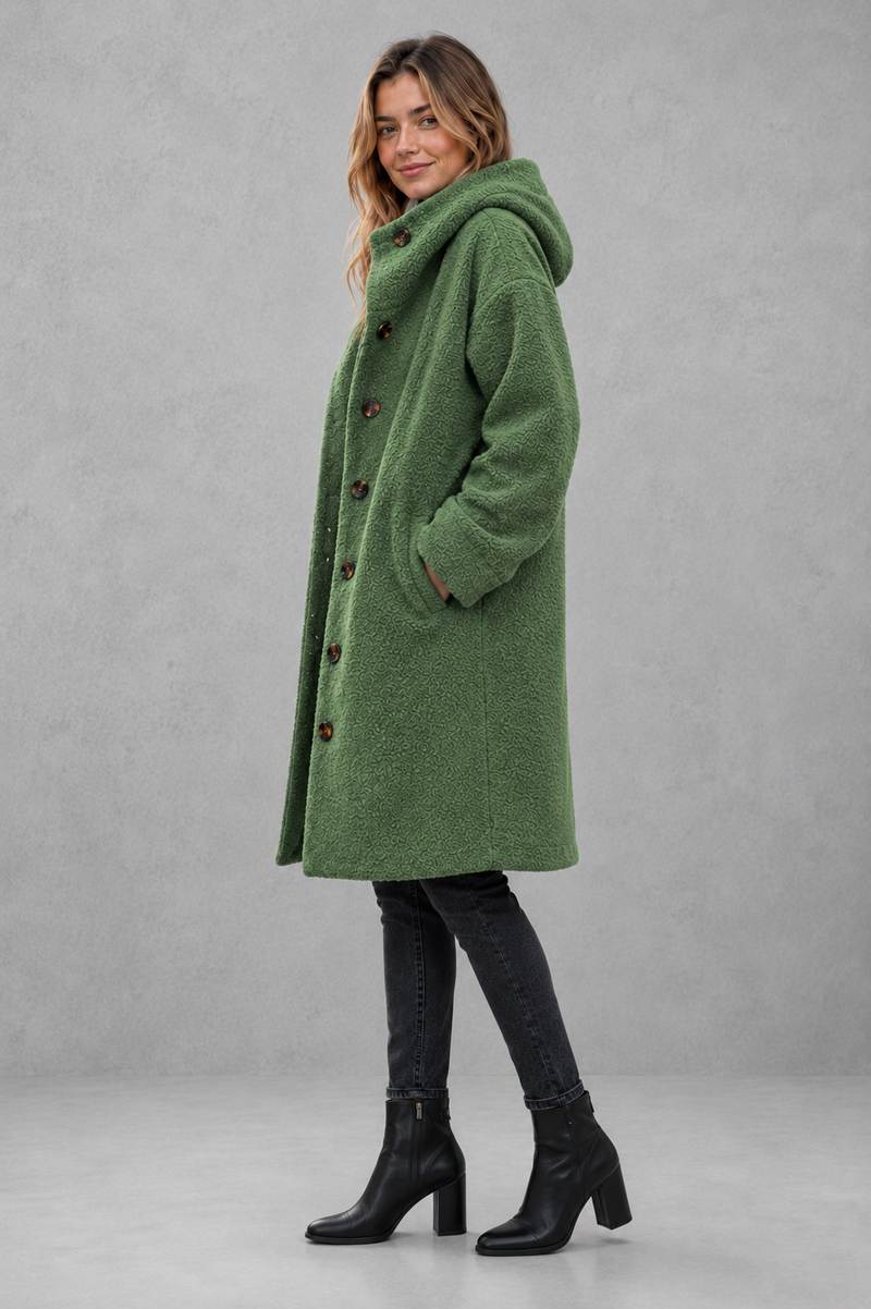 Women's elegant button-front autumn and winter coat with a relaxed fit, classic longline silhouette, soft warm fabric, long sleeves and timeless design, ideal for layering with knitwear, dresses or tailored outfits.