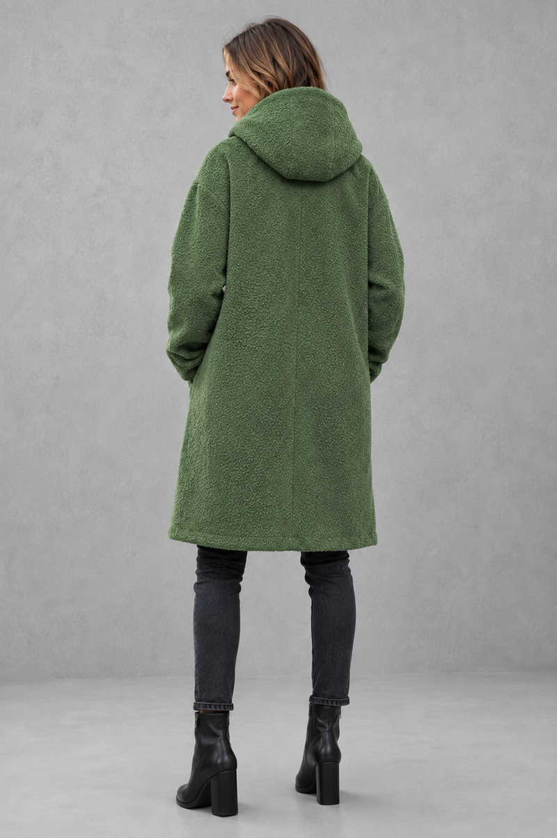 Women's elegant button-front autumn and winter coat with a relaxed fit, classic longline silhouette, soft warm fabric, long sleeves and timeless design, ideal for layering with knitwear, dresses or tailored outfits.