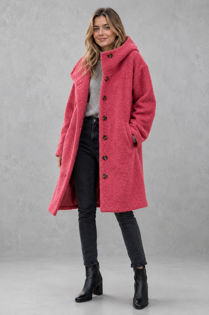 Women's elegant button-front autumn and winter coat with a relaxed fit, classic longline silhouette, soft warm fabric, long sleeves and timeless design, ideal for layering with knitwear, dresses or tailored outfits.