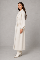 Women’s elegant long double-breasted tailored coat for autumn and winter.