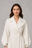 Women’s elegant long double-breasted tailored coat for autumn and winter.