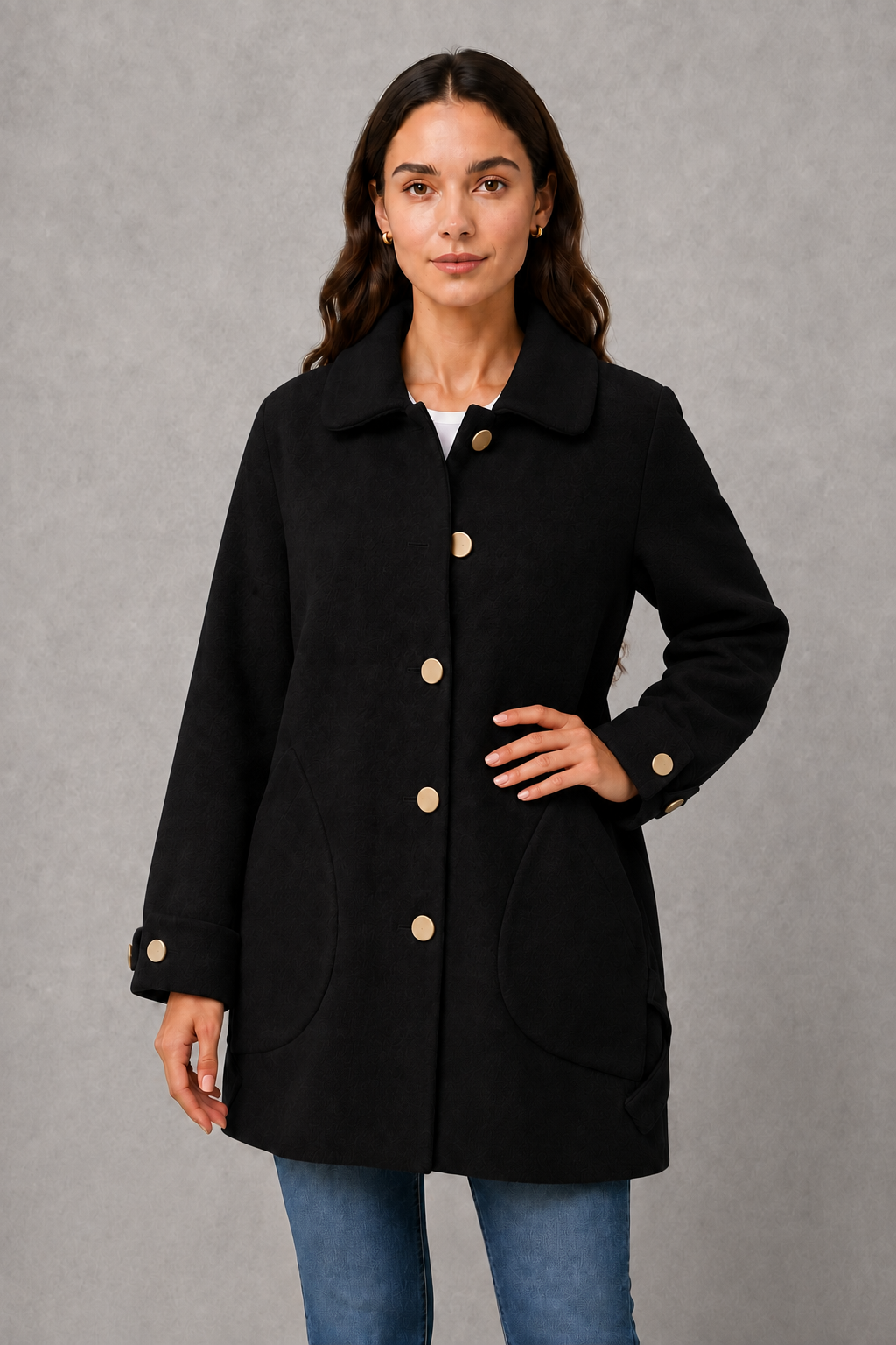 Women’s elegant oversized mid-length coat with spacious pockets and refined cuff detailing, designed for stylish autumn and winter layering.