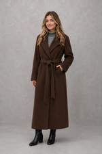 Women's elegant wrap coat in a longline design with a tailored lapel collar and adjustable matching waist belt, offering a flattering regular fit and lightweight warmth for autumn and winter wear.