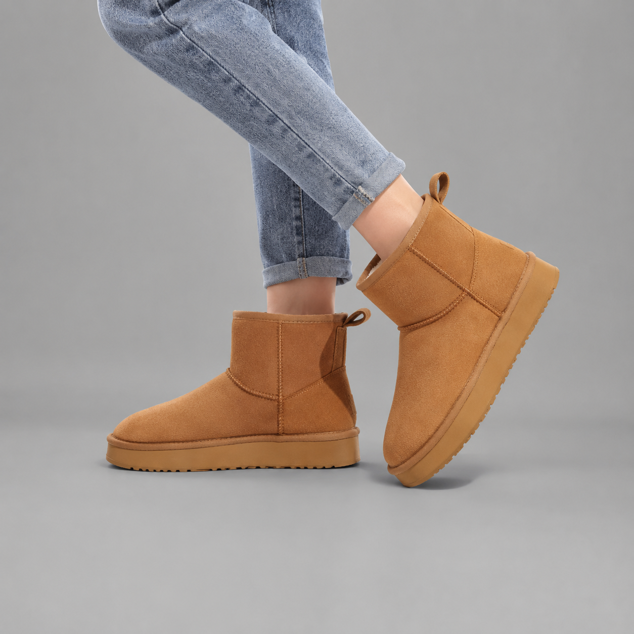 Women's faux suede platform ankle boots with a soft faux fur lining, 2-inch lightweight EVA platform sole, slip-on design with rear pull tab, and non-slip outsole, offering warm and stylish comfort for autumn and winter wear.