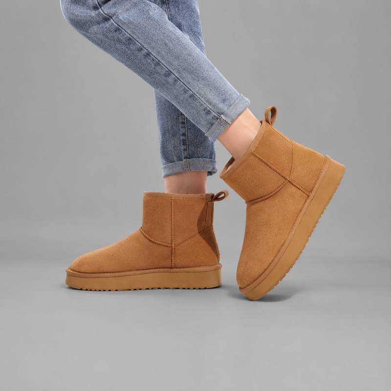 Women's faux suede platform ankle boots with a soft faux fur lining, 2-inch lightweight EVA platform sole, slip-on design with rear pull tab, and non-slip outsole, offering warm and stylish comfort for autumn and winter wear.