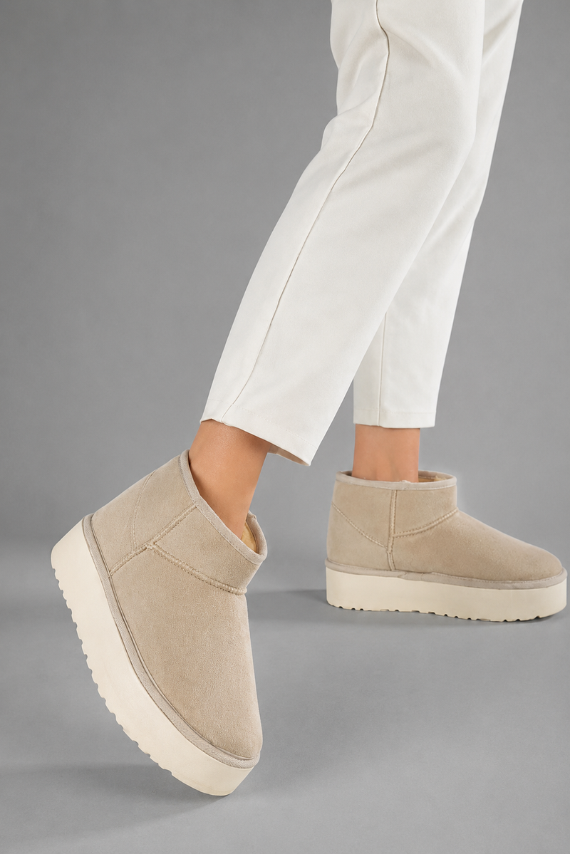 Women's faux suede platform snow boots with a soft faux fur lining, slip-on ankle-height design, round toe, back pull tab, 1.75-inch platform sole and non-slip outsole for warm, comfortable winter everyday wear.