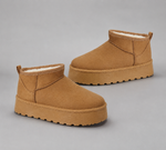 Women's faux suede platform snow boots with a soft faux fur lining, slip-on ankle-height design, round toe, back pull tab, 1.75-inch platform sole and non-slip outsole for warm, comfortable winter everyday wear.