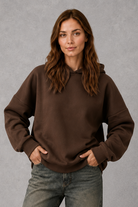 Women’s relaxed-fit fleece hoodie in a soft cotton and recycled polyester blend with long sleeves, ribbed cuffs and hem.