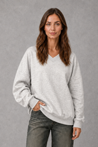 Women’s relaxed-fit fleece hoodie in a soft cotton and recycled polyester blend with long sleeves, ribbed cuffs and hem.