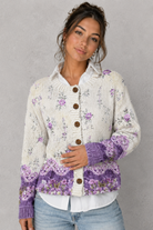 Women's floral knit open-front cardigan in a soft knitted fabric with a relaxed fit, featuring an elegant floral pattern, long sleeves, and a lightweight design for comfortable everyday layering during cooler seasons.