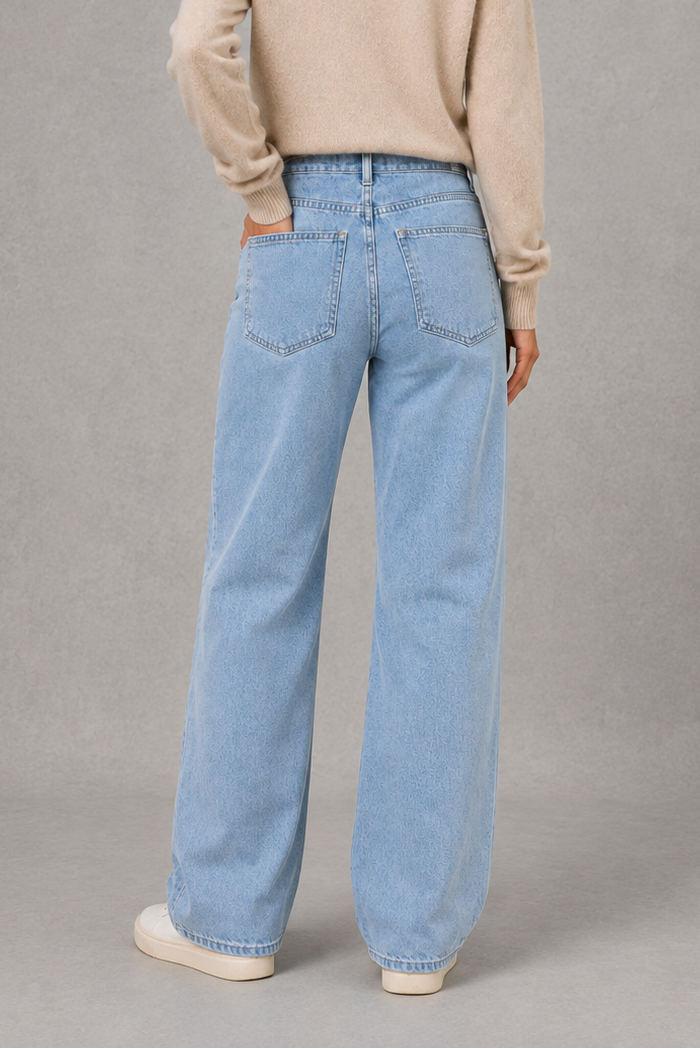 Women’s high waisted wide leg jeans in light wash denim with a relaxed straight leg, classic five-pocket design and button-and-zip fastening.