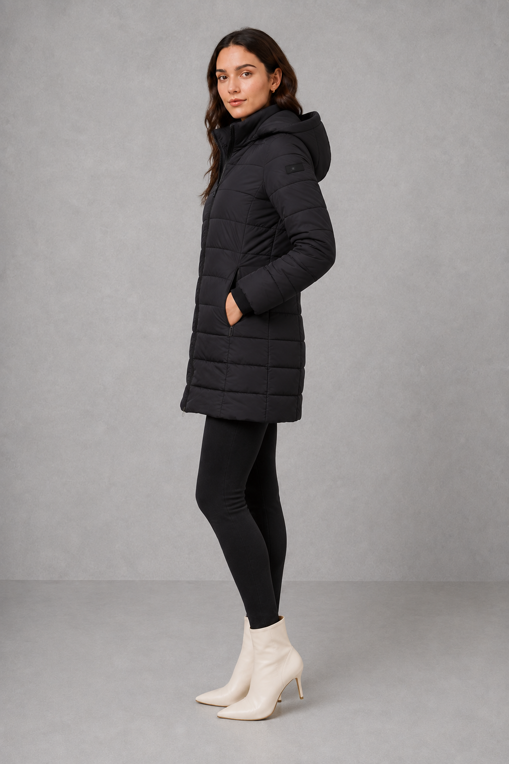 Women’s lightweight insulated hooded coat with padded design, full zip fastening and streamlined fit for autumn and winter.
