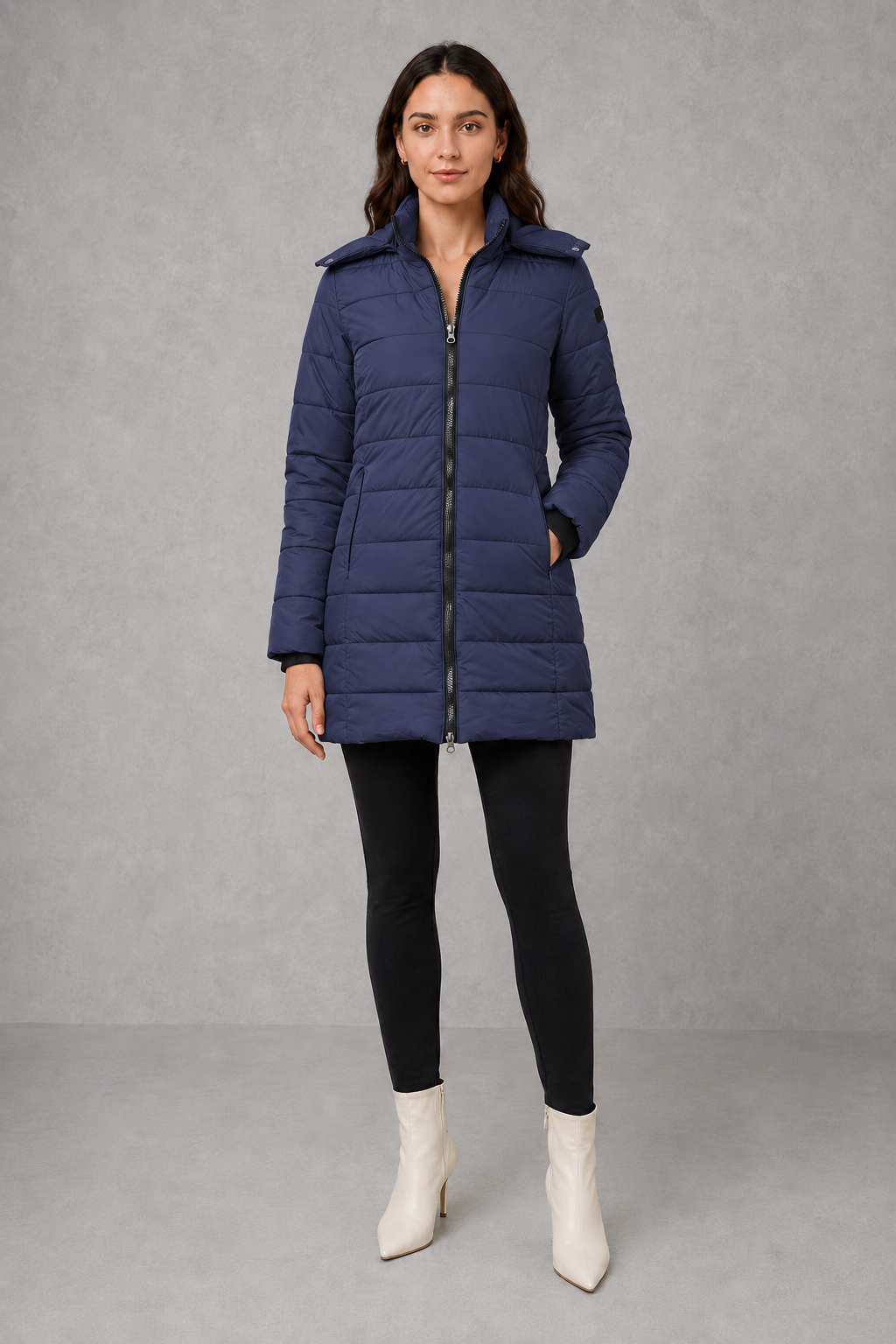 Women’s lightweight insulated hooded coat with padded design, full zip fastening and streamlined fit for autumn and winter.