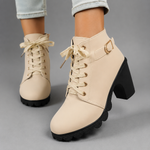 Women’s lace-up buckle chunky heel ankle boots with a round toe, decorative buckle straps and sturdy rubber sole, stylish combat-inspired boots for everyday autumn and winter wear.