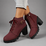 Women’s lace-up buckle chunky heel ankle boots with a round toe, decorative buckle straps and sturdy rubber sole, stylish combat-inspired boots for everyday autumn and winter wear.