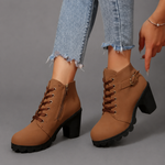 Women’s lace-up buckle chunky heel ankle boots with a round toe, decorative buckle straps and sturdy rubber sole, stylish combat-inspired boots for everyday autumn and winter wear.