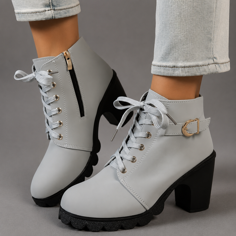 Women’s lace-up buckle chunky heel ankle boots with a round toe, decorative buckle straps and sturdy rubber sole, stylish combat-inspired boots for everyday autumn and winter wear.