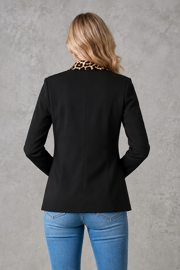 Women's elegant open-front blazer with leopard print lapels and pocket flap detailing, featuring a tailored hip-length fit for work and smart casual occasions.
